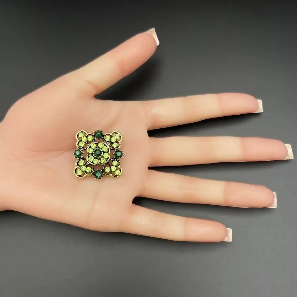Yellow Gold with Emerald and Peridot Green Crystal Ornate Pin Back Brooch
